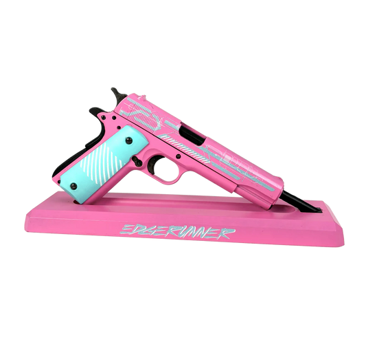 1911 Edge Runner pink and turquoise miniature model on display stand, left side