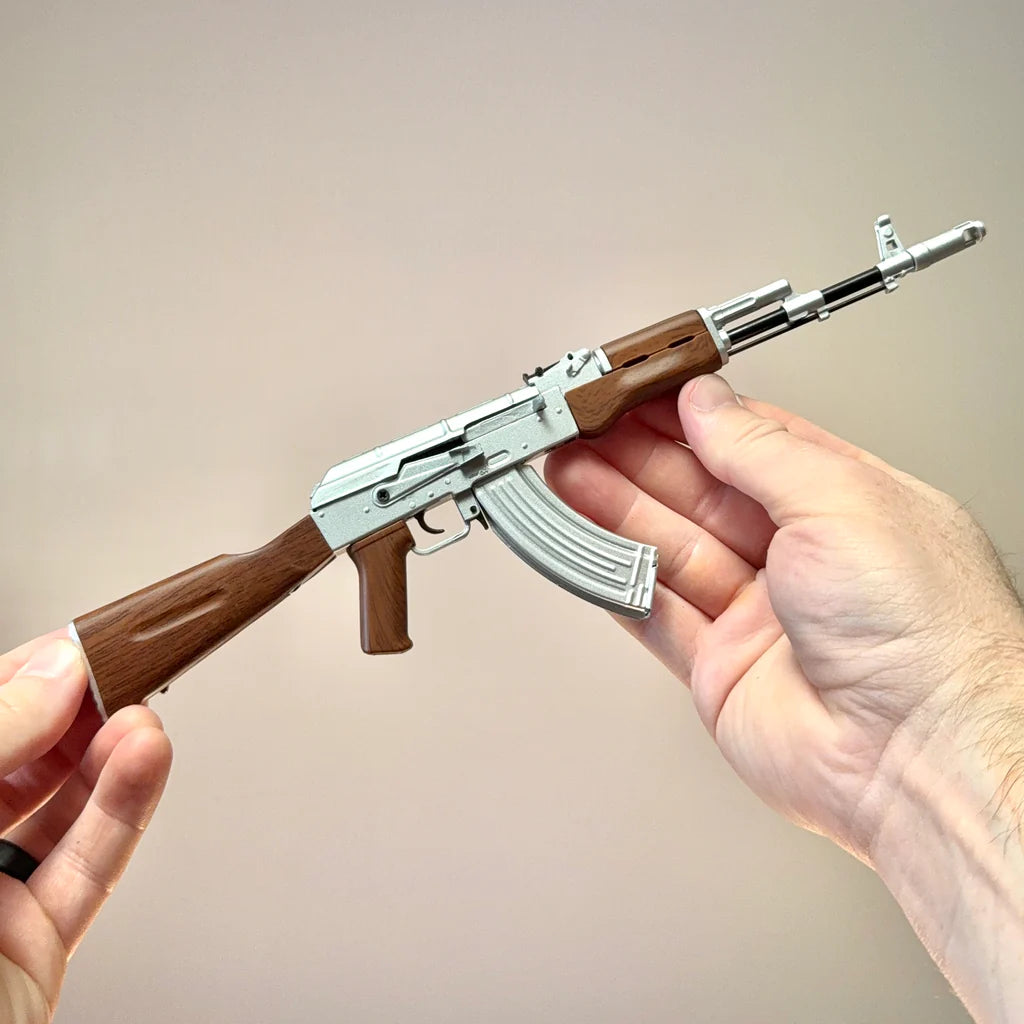 AK47 Silver model held in hands