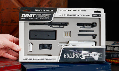 White Bullpup model held in hand
