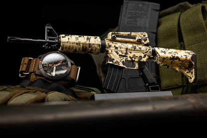 AR15 Desert Storm model beside a watch