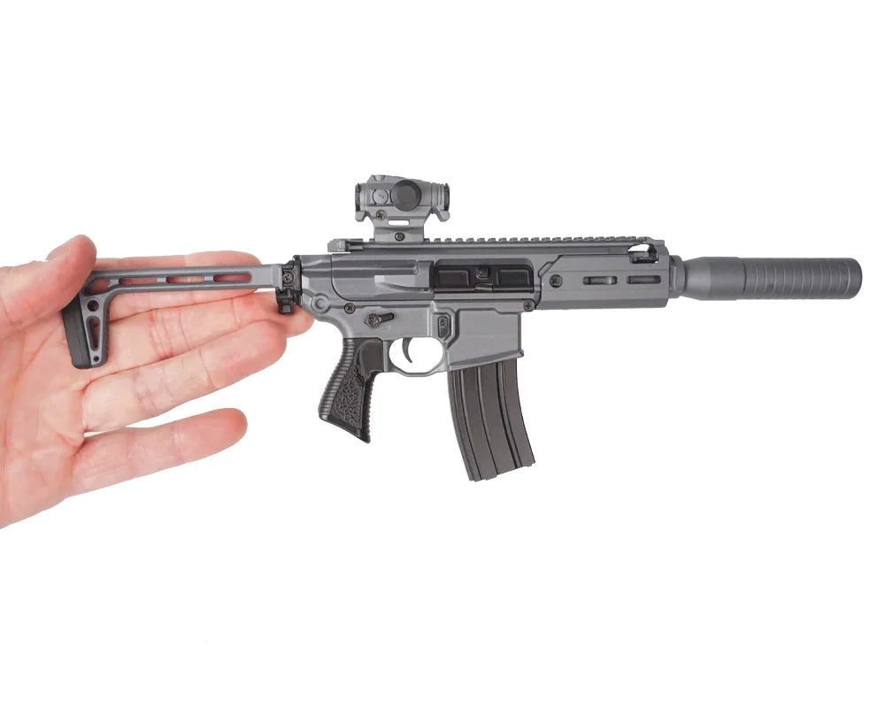 SIG MCX Concrete miniature model held in hand