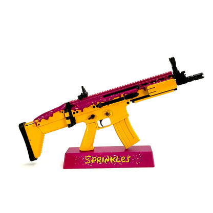 FN SCAR Sprinkles model on pink display stand