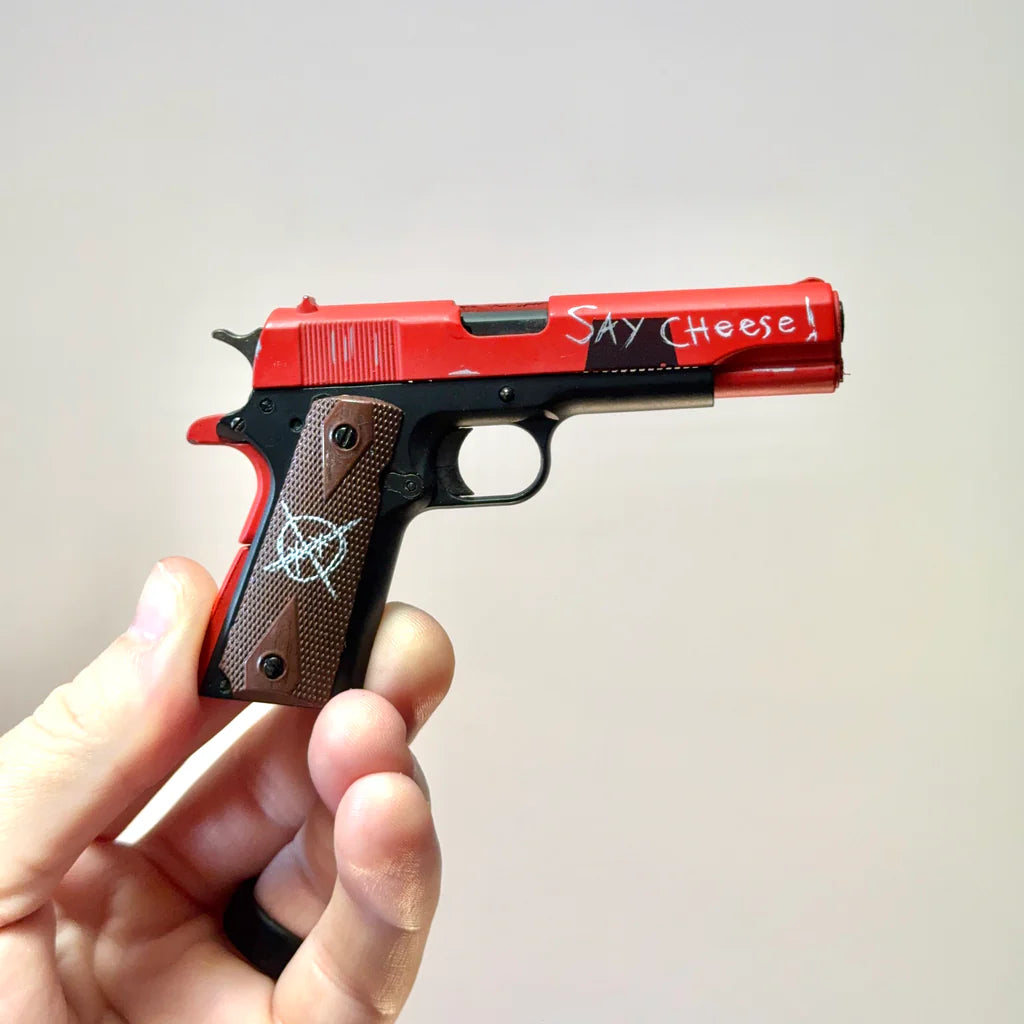 1911 Mercenary miniature held in hand