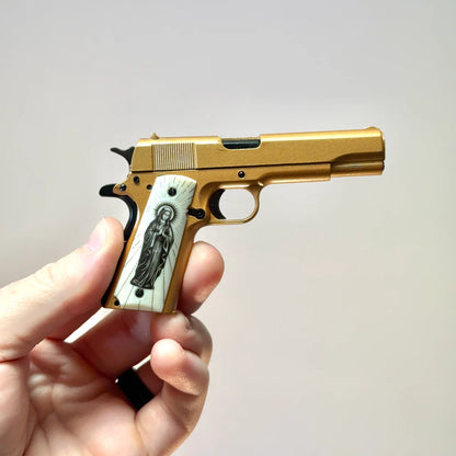 El Jefe gold 1911 model held in hand