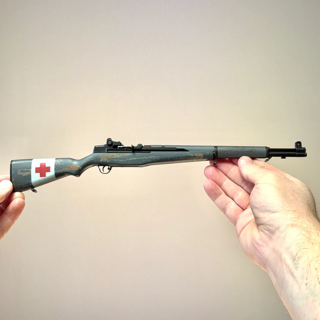Medic M1 Garand limited edition scale model held in hands, full side view