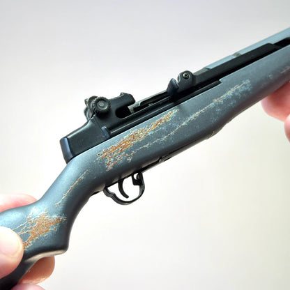 Medic M1 Garand model close-up of weathered grey finish and action