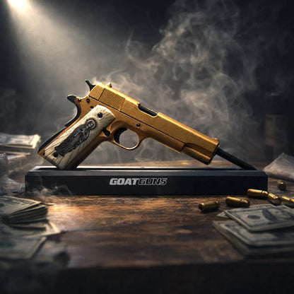 Gold 1911 El Jefe limited edition model on display stand