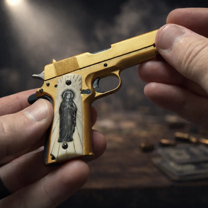 El Jefe gold 1911 model with Virgin Mary grip detail