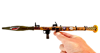 Nosebomb RPG miniature model held in hand