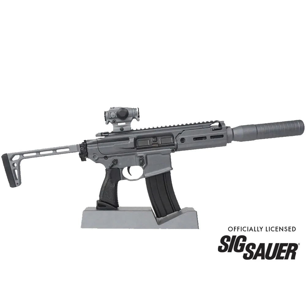 SIG MCX Concrete model with suppressor on display stand