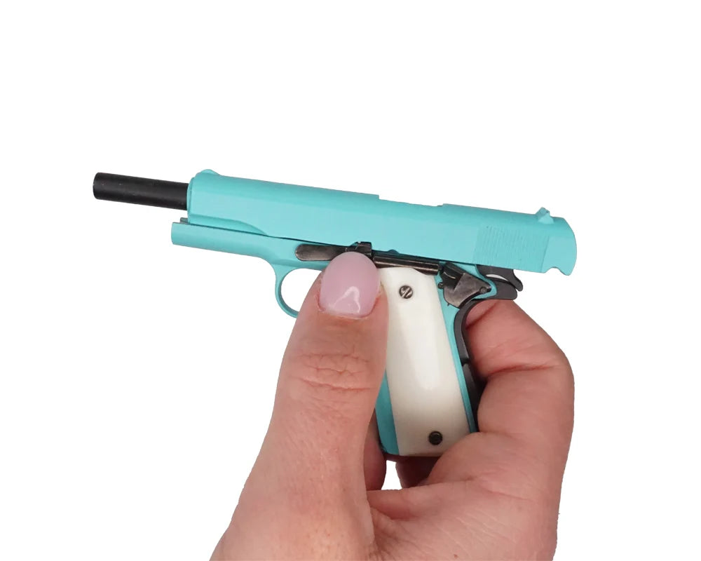 Bunny blue miniature 1911 model close-up of slide and safety