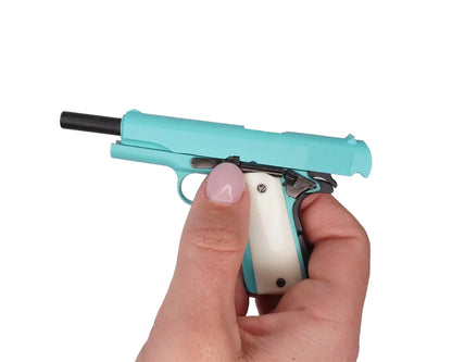 Bunny blue miniature 1911 model close-up of slide and safety