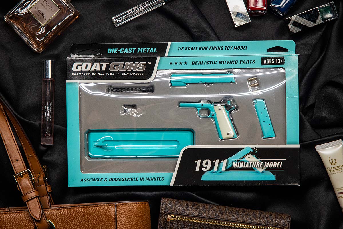 Bunny blue miniature 1911 model retail packaging; packaging scale label is incorrect