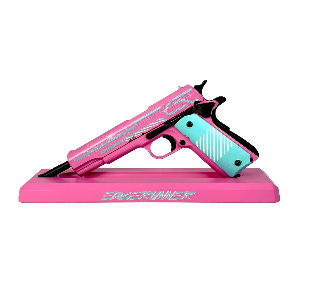 1911 Edge Runner pink and turquoise miniature model on display stand, opposite side