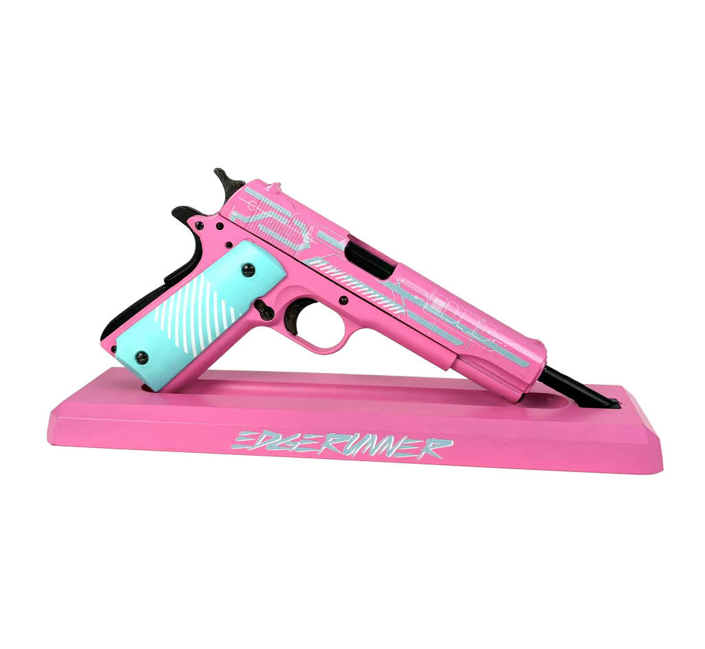 1911 Edge Runner pink and turquoise miniature model on display stand, left side