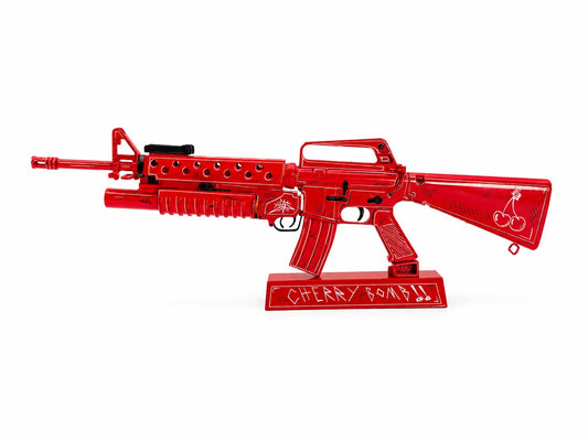 M16A1 Cherry Bomb model on display stand, side with Cherry Bomb lettering